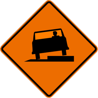 SHOULDER DROP OFF - LEFT SYMBOL